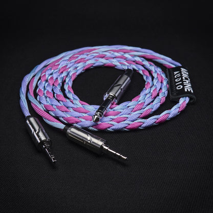 Braided audio cable with metal connectors on a black background