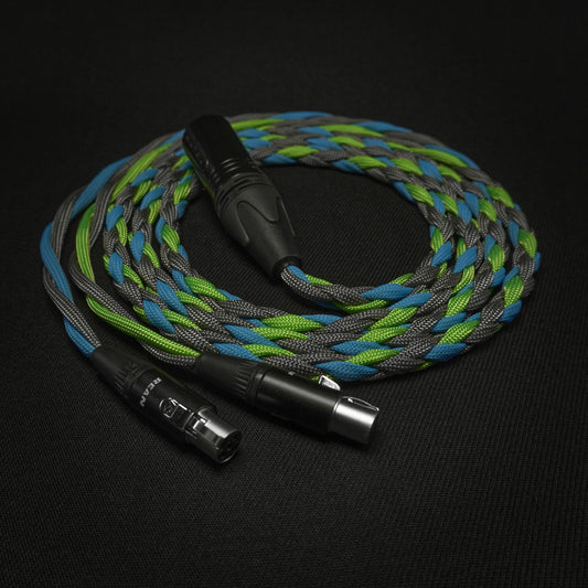 Braided audio cable with XLR connectors on a black background