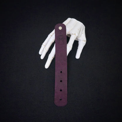 Fermata leather cable organizer in Screamer (purple) with brass stud and embossed Arachne spider - Halloween limited edition